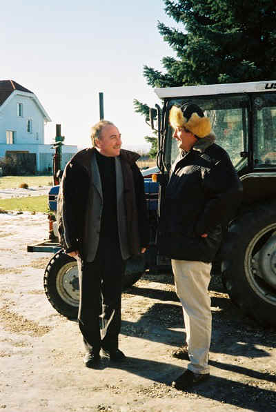 Tim Clarke chats with Willi by the new tractor